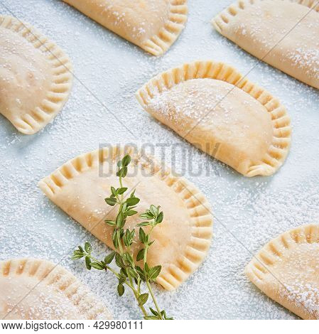 Raw Empanadillas, Small Filling Tuna Pies, Tomato Sauce, Bell Pepper, Boiled Egg. Before To Baked In