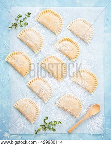 Raw Empanadillas, Small Filling Tuna Pies, Tomato Sauce, Bell Pepper, Boiled Egg. Before To Baked In