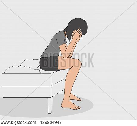 Upset Girl. The Woman Sits On The Edge Of The Bed And Holds Onto Her Head, A Girl Has A Headache. Ve