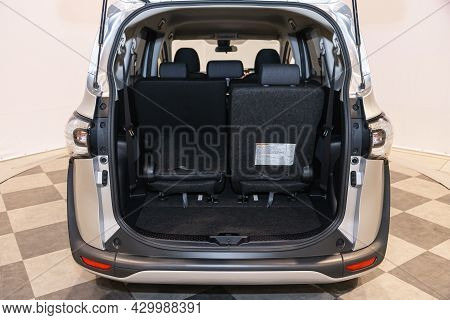 Novosibirsk, Russia - July 15, 2021:   Toyota Sienta, Rear View Of A Car With An Open Trunk. Exterio