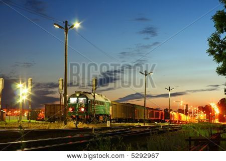 Freight Train At The Station