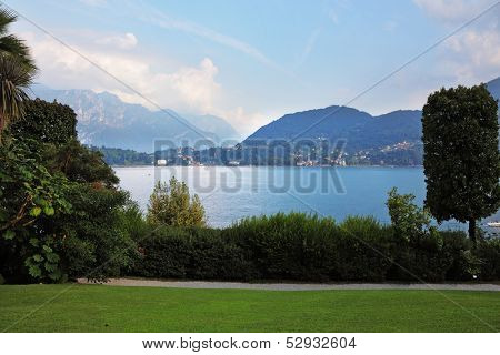 Toblino lake in the mountains of northern Italy and a medieval castle 