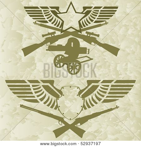 Badges with wings and firearms