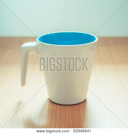 A Cup Of Coffee On Wooden Background