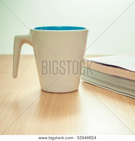 cup and book