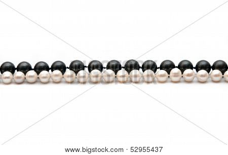 Black and white pearls rows