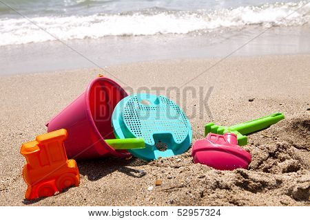 Plastic Toys On The Beach