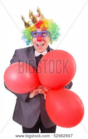 Businessman with crown isolated on white