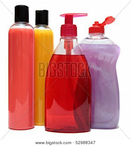 four colored plastic bottles