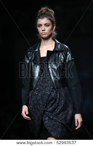 ZAGREB, CROATIA - OCTOBER 25: Fashion model wearing clothes designed by Etna Maar on the Cro a Porter show on October 25, 2013 in Zagreb, Croatia.