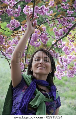 Beautiful Woman Under The Blooming Sakura In Spring