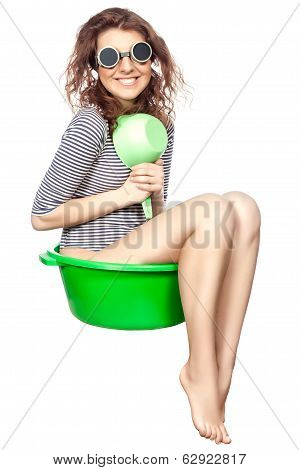 Girl Sitting In A Basin Rides.