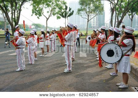 Teenager Play Musical Instruments At Social Event