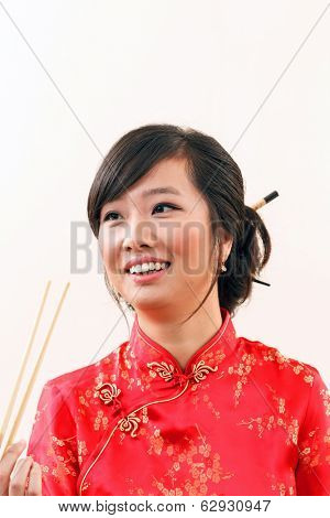 chinese woman with chopstics