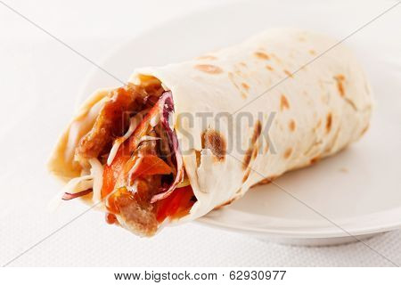 tortilla fajita wraps with meat and vegetables