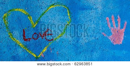 Grunge Background With Graffiti, Writings And A Painted Heart And Hand On A Concrete Wall