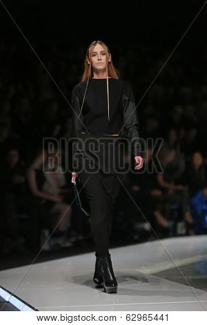 ZAGREB, CROATIA - MARCH 29: Fashion model wearing clothes designed by Silvio Ivkic on the 'Fashion.hr' show on March 29, 2014 in Zagreb, Croatia.