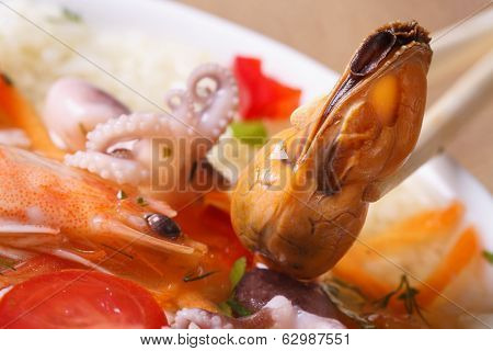 Mussel Without Shell Close Up In Asian Soup