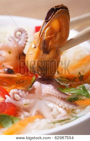 Mussel Hold Chopsticks Close Up Vertical