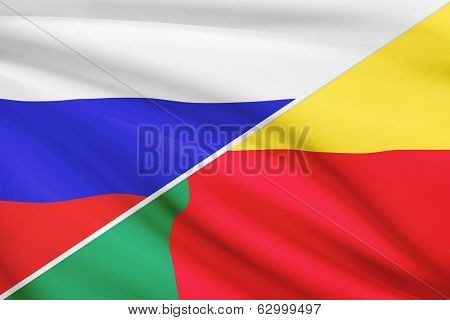 Series Of Ruffled Flags. Russia And Benin.