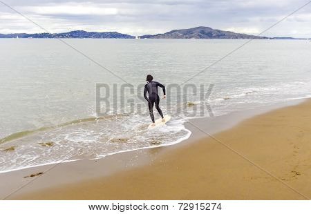 Skimboarding In San Francisco Bay, California