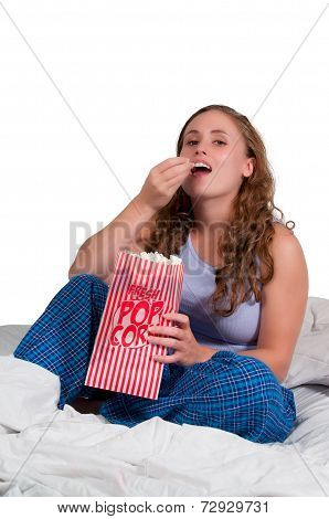 Woman In Bed With Popcorn