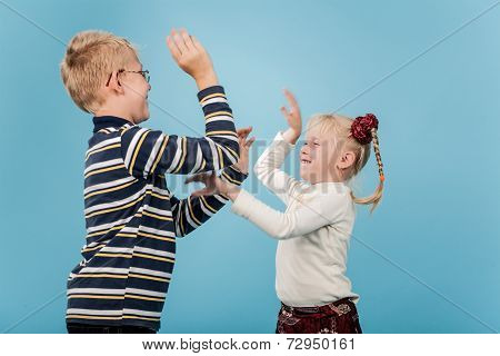 Brother And Sister Start A Playful Fight With Each Other