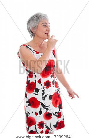 Senior woman making silent sign