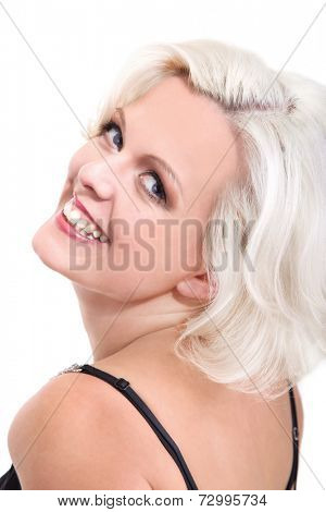 Woman looking over her shoulders wearing spaghetti strap top