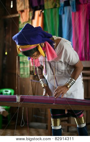 A Kayan Lahwi Oldest Woman Is Spinning.