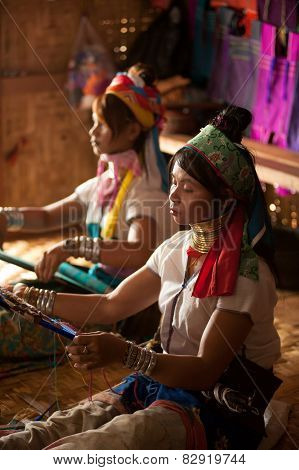 Two Kayan Lahwi Girls are Weaving.