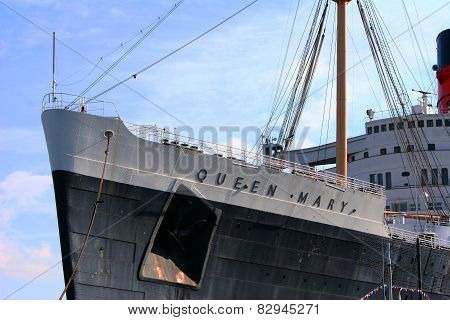 LOS ANGELES - DEC 21, 2008: Antique Cruise ship Queen Mary and Russian Scorpion homeported in Long Beach, California, USA.