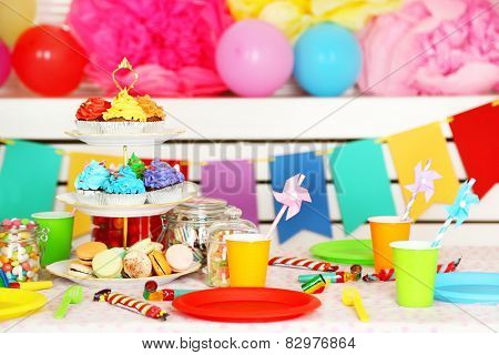 Prepared birthday table with sweets for children party