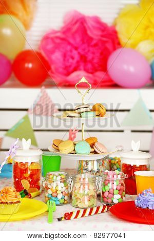 Prepared birthday table with sweets for children party