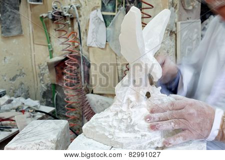 Artist Sculpting Alabaster