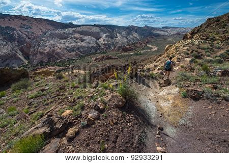 Girl Hiker In A Brimhall Natural Bridge Trail Capitol Reef National Park