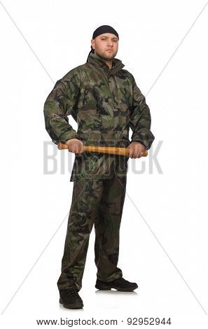 Young man in soldier uniform holding bludgeon isolated on white