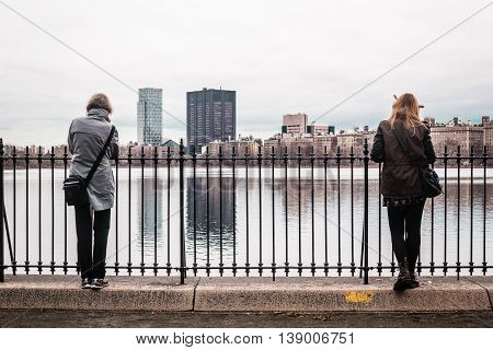 Girl On A Fence At Central Park In Manhattan, New York City