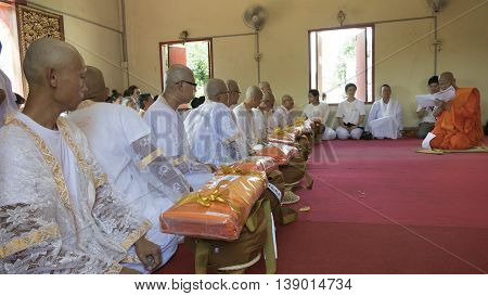 Man Who Will Become Buddhism Monk Sitting And Waiting For Ordination Ceremony