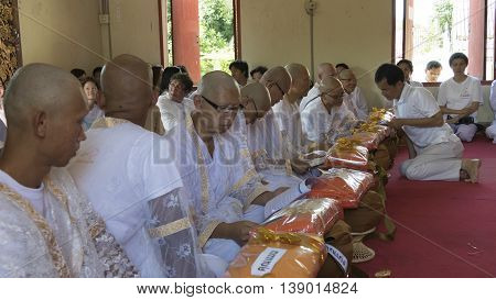 Man Who Will Become Buddhism Monk Sitting And Waiting For Ordination Ceremony