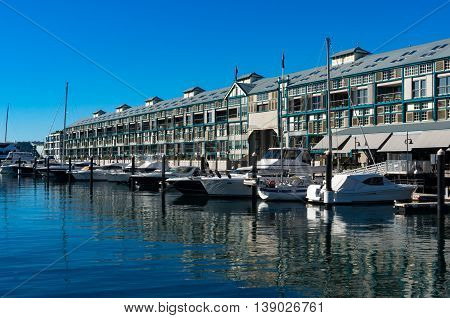 Woolloomooloo bay with historic Finger wharf which is the longest timbered-piled wharf in the world. Sydney Australia