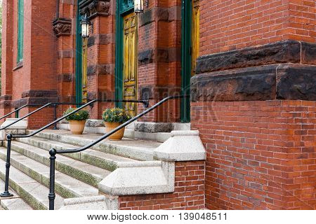 Medieval Architecrure With Red Brick And Concrete Stairs