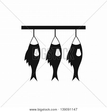 Three dried fish hanging on a rope icon in simple style isolated vector illustration