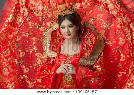 Beautiful Asian Model Young Asia Oriental Woman Wearing Chinese Qipao Dress - Studio Shot