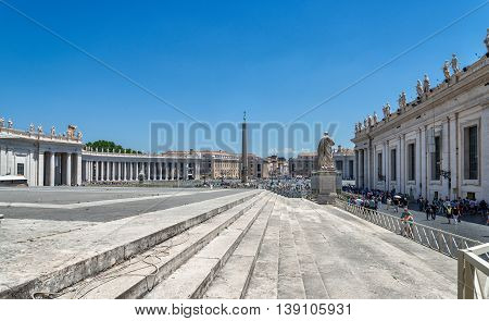 VATICAN CITY - JULY 1 2016: St. Peter's square is one of the largest plaza located directly in front of St. Peter's Basilica in the Vatican City the papal enclave inside Rome