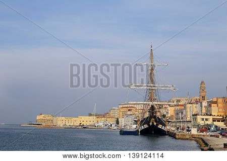 GAETA ITALY - JUNE 25 2016: The three masted Palinuro a historic Italian Navy training barquentine moored in the Gaeta port.