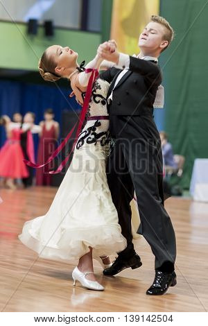 Minsk Belarus -May 29 2016: Danilevich Kevin and Dorosh Dariya Perform Juvenile-1 Standard European Program on National Championship of the Republic of Belarus in May 29 2016 in Minsk Republic of Belarus