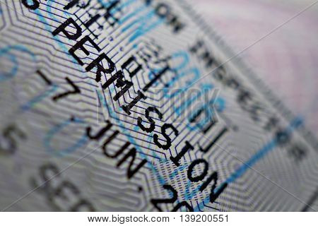 Printed passport stamp with a caption Landing permission in black ink as a part of Japanese Visa page
