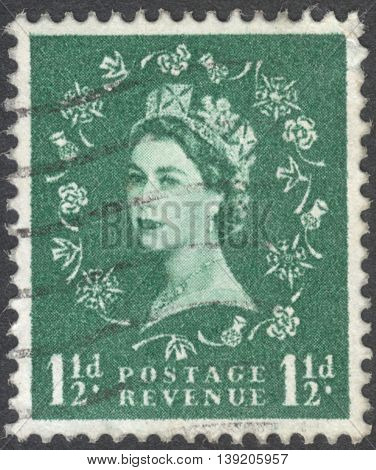 MOSCOW RUSSIA - JANUARY 2016: a post stamp printed in the UNITED KINDOM shows a Portrait of Queen Elizabeth II circa 1960