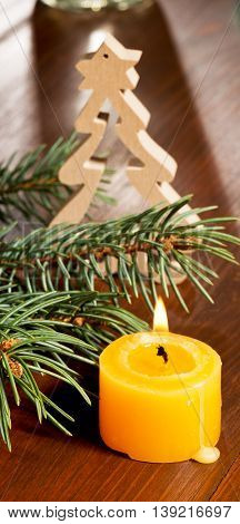 still life with christmas decoration and a candle